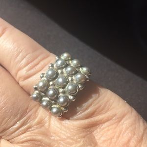 Silver ring with 15 little pearls